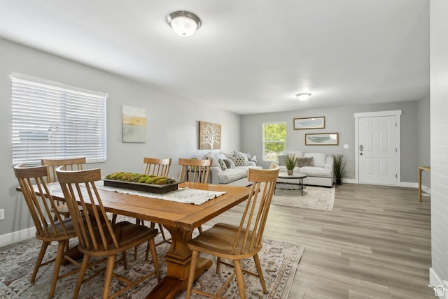 8392 S Oak Vista Dr, West Jordan, UT 84081 - dining space with baseboards and light wood finished floors