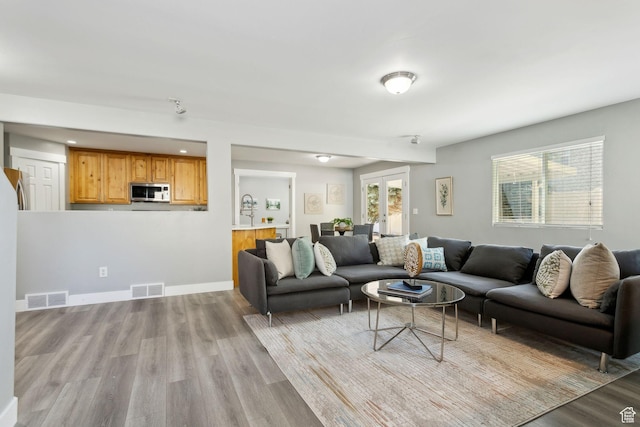 8392 S Oak Vista Dr, West Jordan, UT 84081 - living room featuring light wood-type flooring and recessed lighting