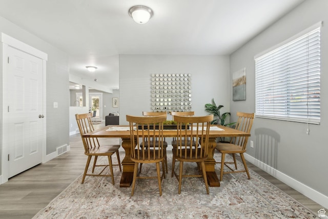 8392 S Oak Vista Dr, West Jordan, UT 84081 - dining area featuring wood finished floors and baseboards
