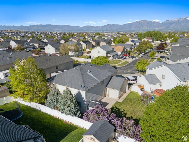 8392 S Oak Vista Dr, West Jordan, UT 84081 - aerial perspective of suburban area with a mountain backdrop
