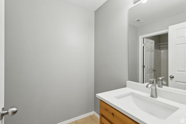 8392 S Oak Vista Dr, West Jordan, UT 84081 - bathroom with vanity, baseboards, and tile patterned floors