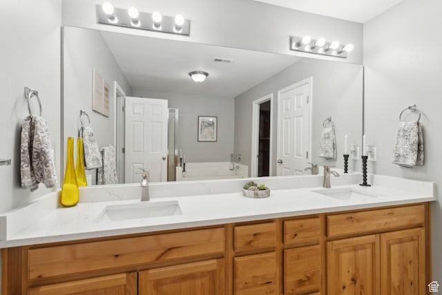 8392 S Oak Vista Dr, West Jordan, UT 84081 - full bathroom with double vanity and a bath