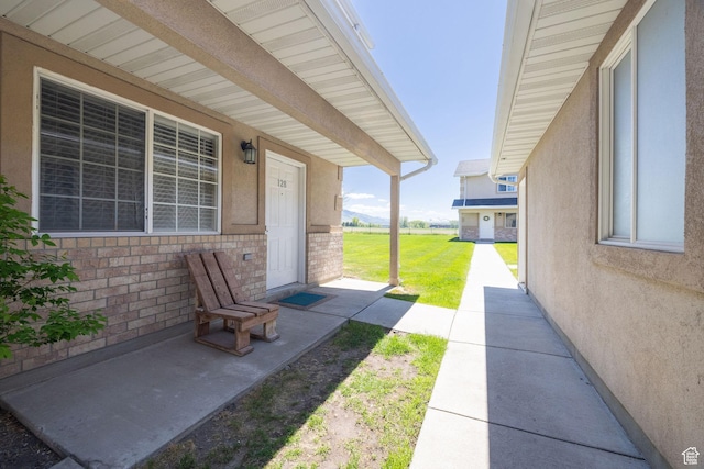 view of patio featuring a porch