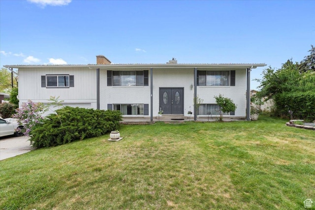 1471 W 1460 N, Provo, UT 84604 - back of property featuring a yard, a chimney, and brick siding