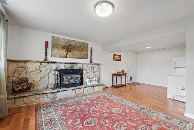 1471 W 1460 N, Provo, UT 84604 - living room featuring wood finished floors and a stone fireplace