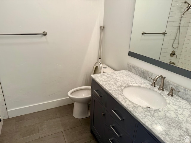 9977 S Lannae Dr E, Sandy, UT 84094 - bathroom with vanity, a shower, toilet, and baseboards
