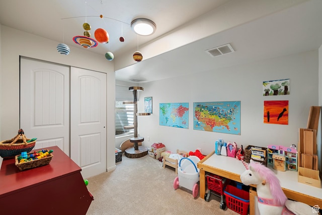 rec room featuring carpet flooring