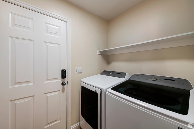 laundry room featuring independent washer and dryer