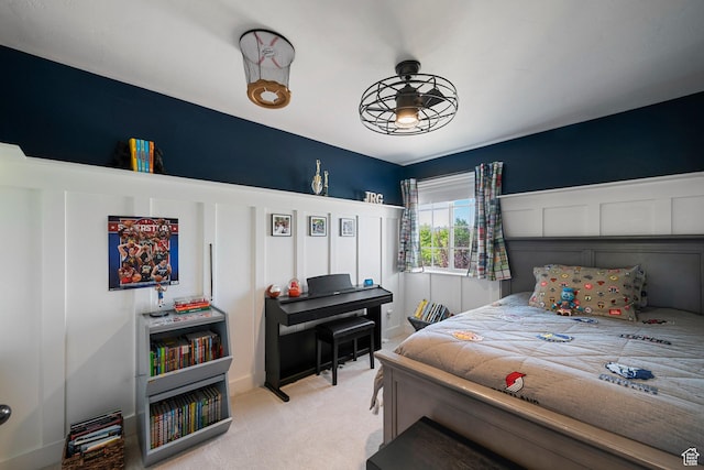 bedroom with light colored carpet