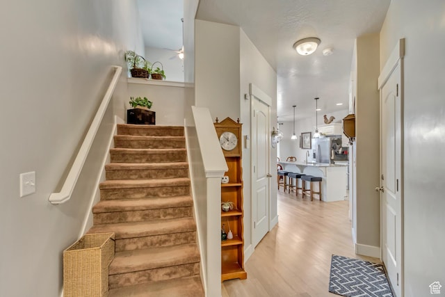 14397 S Hill Shadow Way Unit 87, Herriman, UT 84096 - stairs featuring wood finished floors and ceiling fan