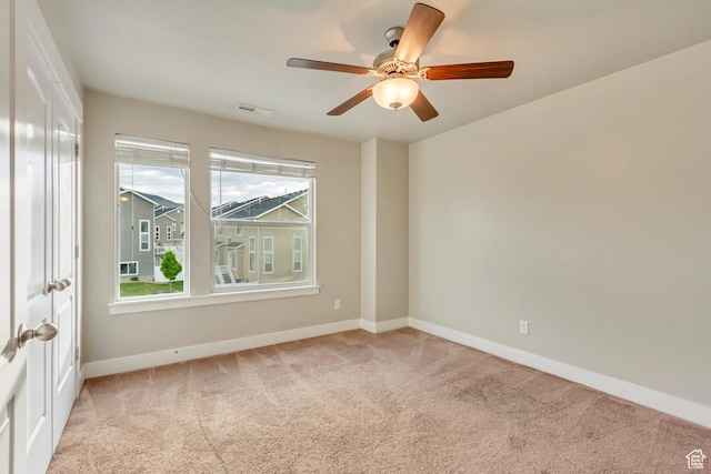 14397 S Hill Shadow Way Unit 87, Herriman, UT 84096 - empty room featuring carpet floors, baseboards, and a ceiling fan