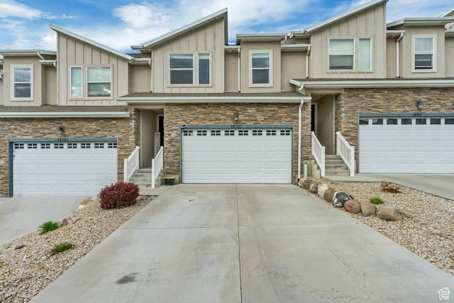 14397 S Hill Shadow Way Unit 87, Herriman, UT 84096 - townhome / multi-family property with board and batten siding, a garage, and driveway