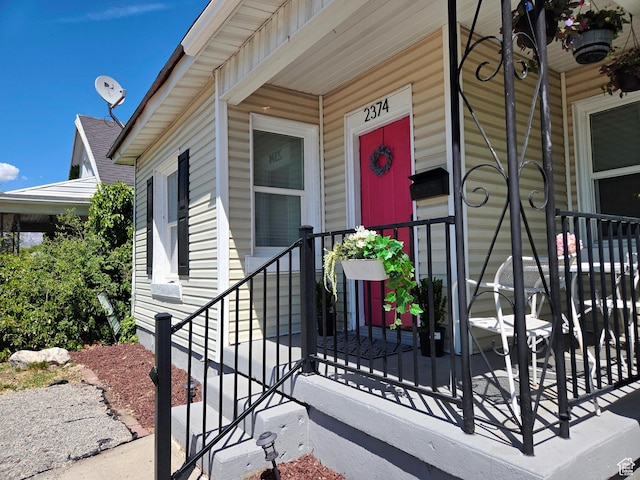 doorway to property with a porch