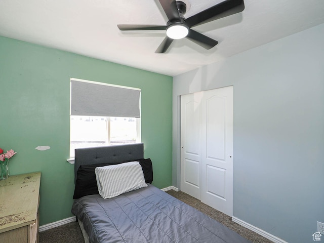 bedroom featuring carpet flooring, baseboards, a closet, and a ceiling fan