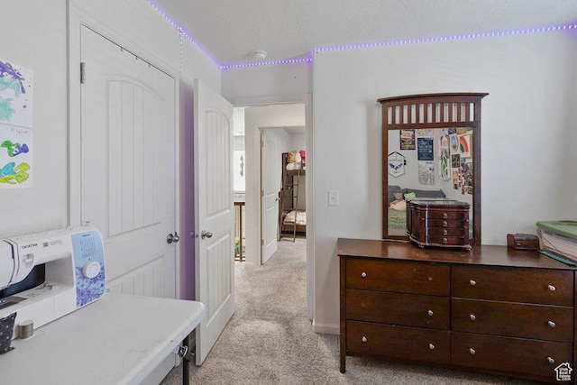 bedroom with light carpet