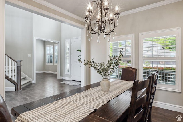 dining space with baseboards, ornamental molding, dark wood-style floors, stairway, and a chandelier