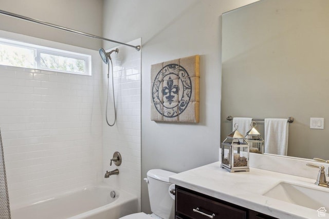 full bathroom featuring vanity, toilet, and shower / bathtub combination