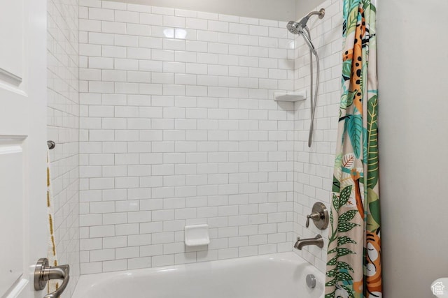 full bath featuring shower / bath combo