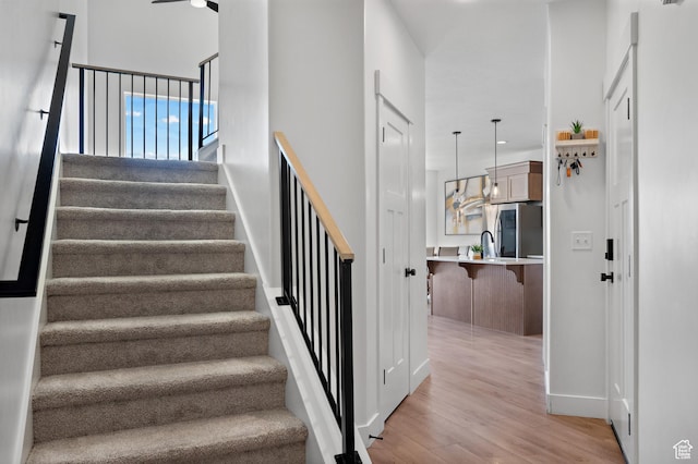 2005 N 4260 W, Lehi, UT 84043 - stairway with wood finished floors and baseboards