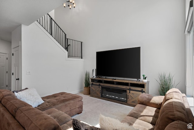 2005 N 4260 W, Lehi, UT 84043 - carpeted living area with a towering ceiling, a chandelier, and stairs
