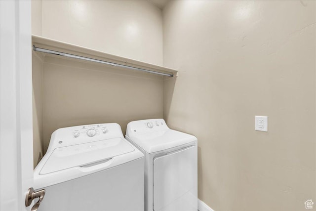 laundry room with washer and dryer