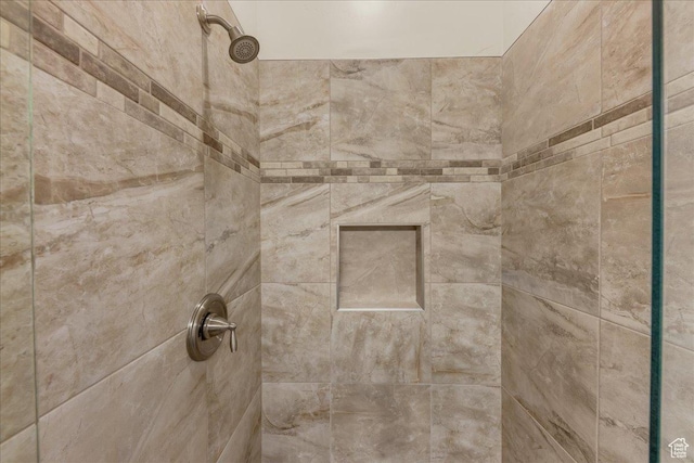 bathroom view of tiled shower