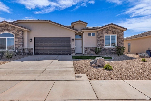 ranch-style home featuring stone siding, stucco siding, and a garage