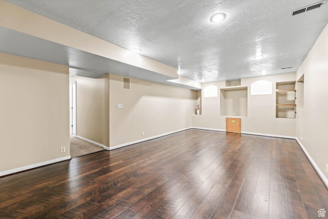 8017 S Showcase Ln, Sandy, UT 84094 - finished below grade area featuring wood-type flooring, baseboards, and a textured ceiling