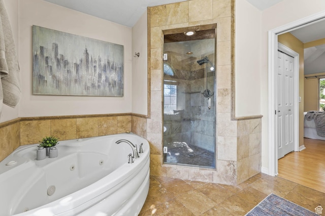 8017 S Showcase Ln, Sandy, UT 84094 - bathroom featuring a shower stall, a whirlpool tub, and stone tile floors