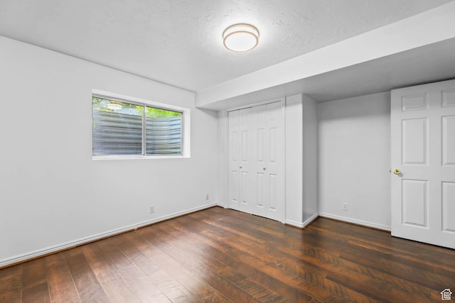 8017 S Showcase Ln, Sandy, UT 84094 - unfurnished bedroom with baseboards, wood finished floors, and a closet