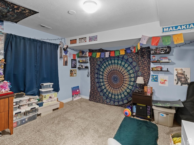 recreation room featuring carpet flooring