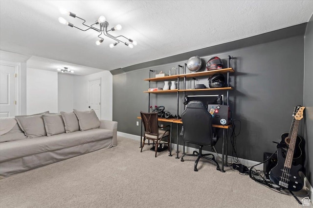 office featuring carpet floors, a textured ceiling, and baseboards