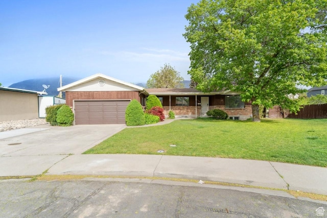 1731 S 145 E, Orem, UT 84058 - ranch-style home featuring an attached garage, driveway, a front yard, and a porch