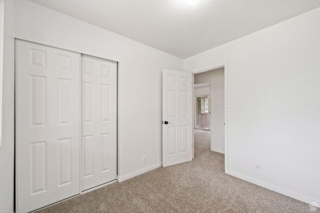 1731 S 145 E, Orem, UT 84058 - unfurnished bedroom with carpet, baseboards, and a closet