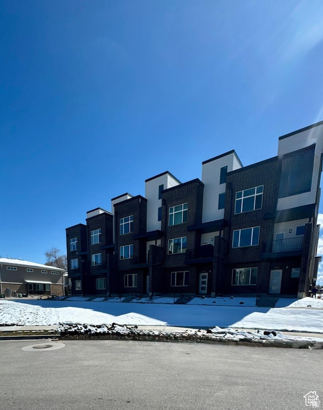 view of snow covered property