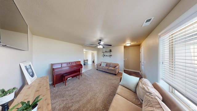 90 W Cedar Ln, Franklin, ID 83237 - living area featuring healthy amount of natural light, ceiling fan, carpet, and baseboards