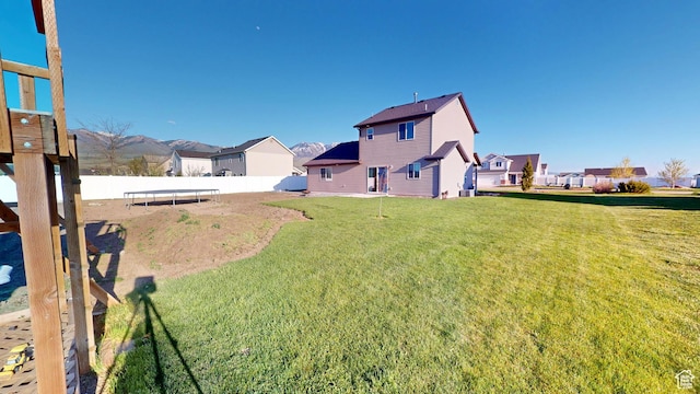 90 W Cedar Ln, Franklin, ID 83237 - view of yard with a trampoline and a residential view