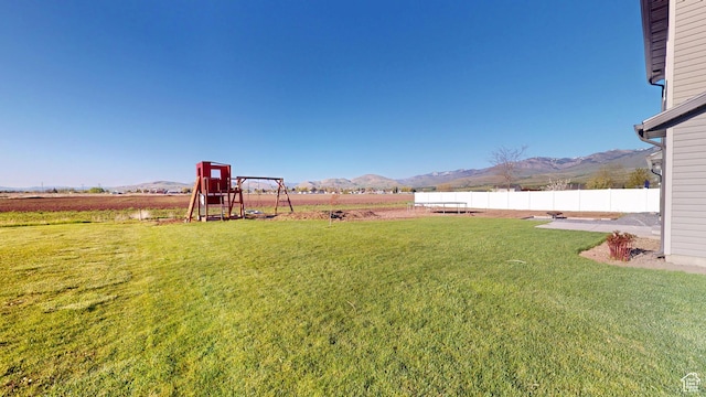 90 W Cedar Ln, Franklin, ID 83237 - view of yard featuring a mountain view and a playground