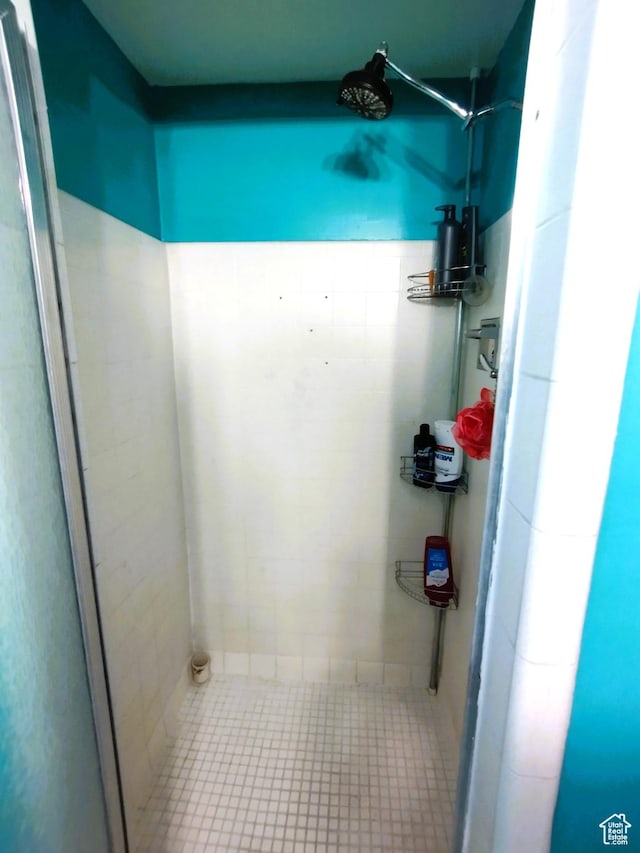 bathroom with a stall shower