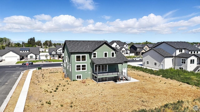 1734 N 4100 W, Plain City, UT 84404 - back of house with a residential view, roof with shingles, and stucco siding