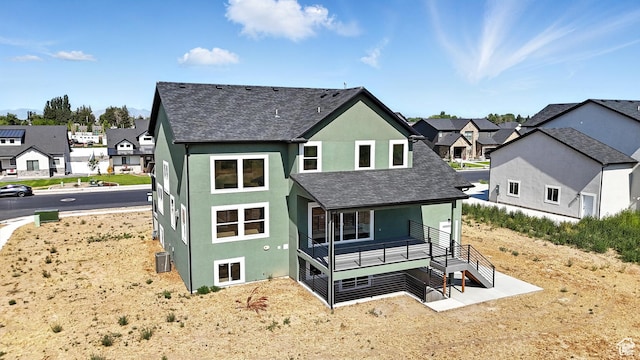 1734 N 4100 W, Plain City, UT 84404 - rear view of house featuring a residential view, stucco siding, and roof with shingles
