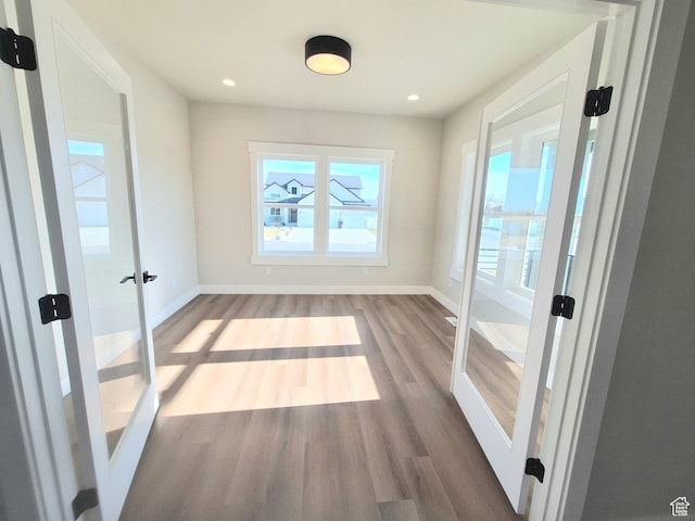 1734 N 4100 W, Plain City, UT 84404 - doorway to outside with wood finished floors, baseboards, and recessed lighting