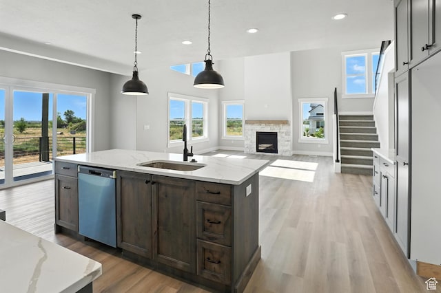 1734 N 4100 W, Plain City, UT 84404 - kitchen with dishwashing machine, plenty of natural light, a center island with sink, light wood-style floors, and recessed lighting