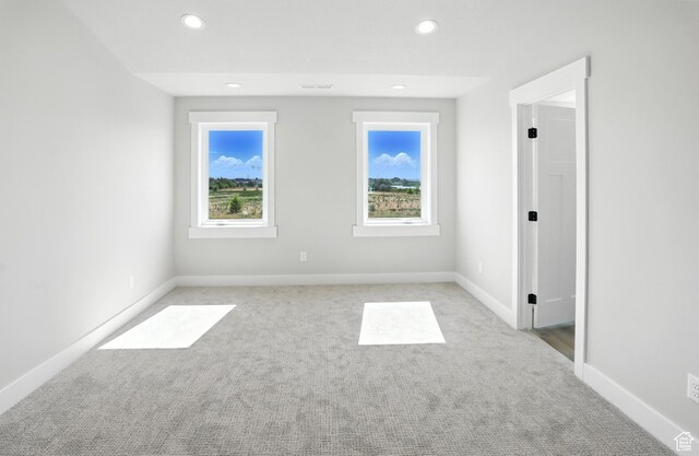1734 N 4100 W, Plain City, UT 84404 - empty room featuring light carpet and recessed lighting