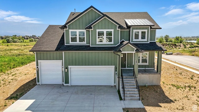 1734 N 4100 W, Plain City, UT 84404 - craftsman house featuring a shingled roof, driveway, a garage, and board and batten siding