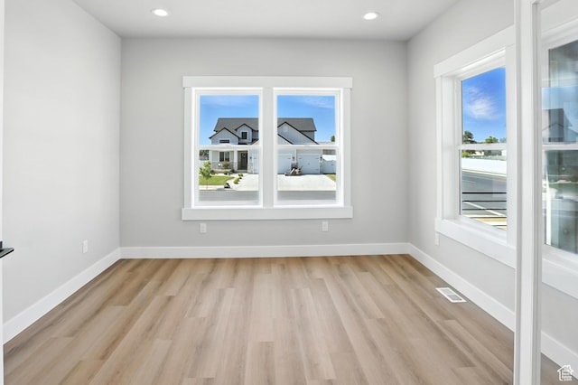 1734 N 4100 W, Plain City, UT 84404 - spare room featuring light wood-type flooring and recessed lighting