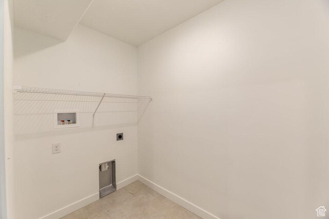 6041 W Lower Ln # 6-234, West Jordan, UT 84081 - clothes washing area featuring hookup for an electric dryer, hookup for a washing machine, and baseboards