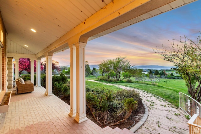 542 E 10000 S, Salem, UT 84653 - patio terrace at dusk featuring covered porch and a yard