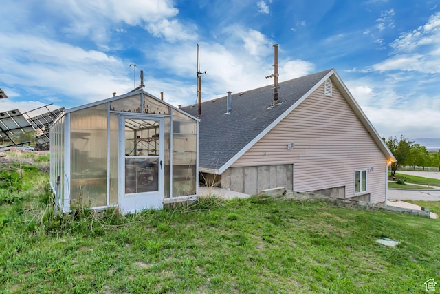 542 E 10000 S, Salem, UT 84653 - back of property with a greenhouse, a shingled roof, an outdoor structure, and a yard