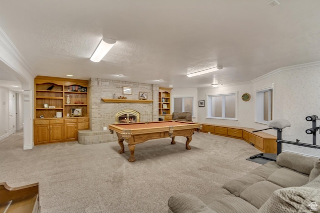 542 E 10000 S, Salem, UT 84653 - playroom featuring light carpet, ornamental molding, a fireplace, built in features, and a textured ceiling